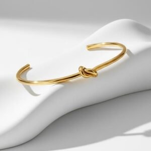 RÉVÉLIAA 18K Yellow Gold Knot Bangle Cuff
